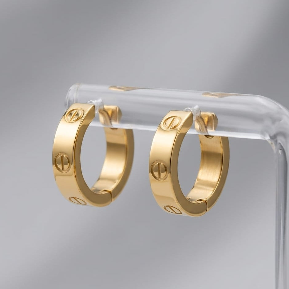 Signature hoop earrings – polished stainless steel with a modern stud design