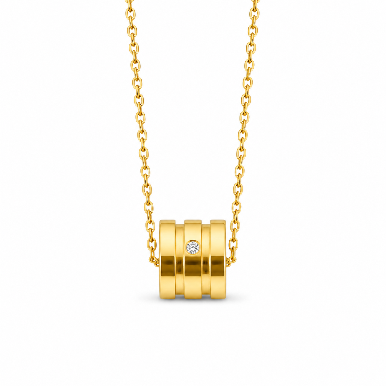 "Golden Cylinder" Necklace – A crystal-encrusted cylindrical pendant in gold-tone stainless steel