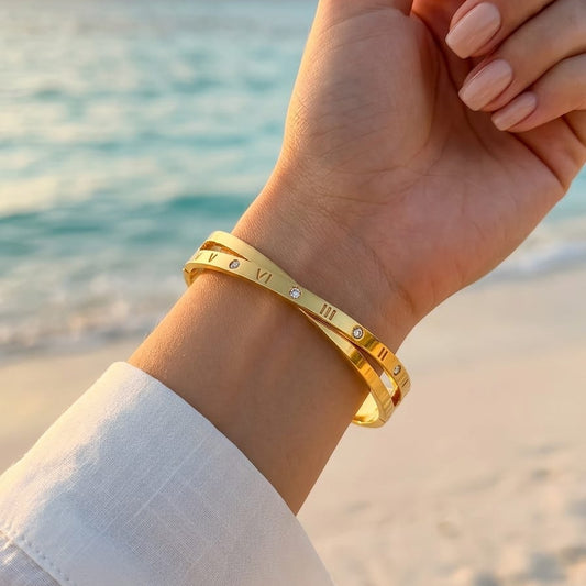 Roman numeral cross bracelet – gold plait