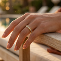 Gold-plated titanium ring encrusted with sparkling crystals