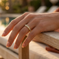 Gold-plated titanium ring encrusted with sparkling crystals