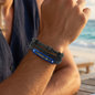 Men's multi-layered leather bracelet with stainless steel, featuring a universal design.