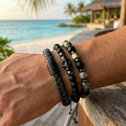 Men's three-piece bracelet set in black and gray with gold details