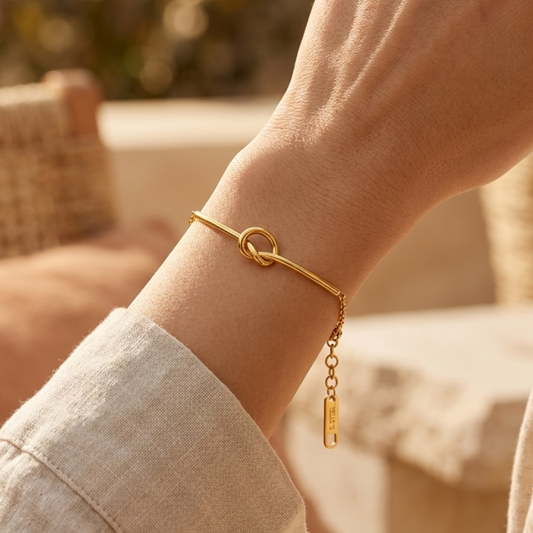 Gold-plated stainless steel bracelet with a modern knot design