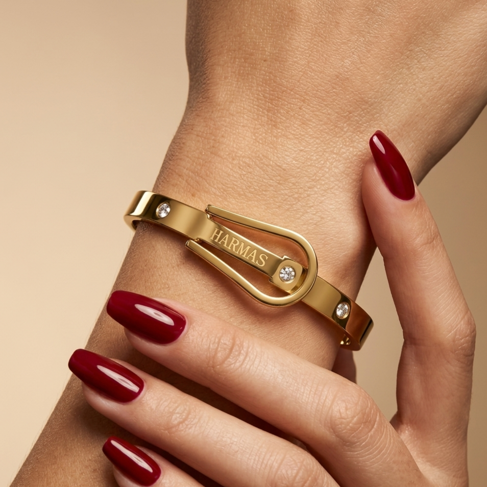 Embellished stainless steel bracelet featuring a belt-buckle design.