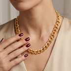Stainless steel chain necklace featuring interlocking, engraved links.