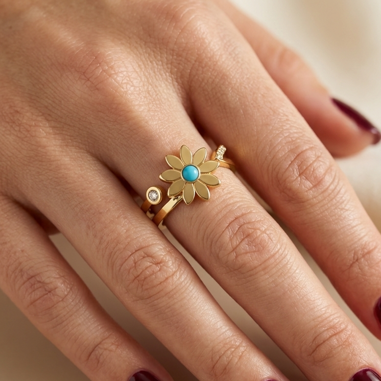 Stainless steel ring featuring a daisy flower, turquoise, and zircon.