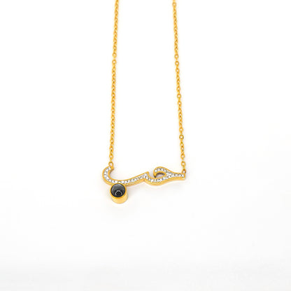Arabian "Love" necklace – gold-plated stainless steel with clear crystal and a secret message