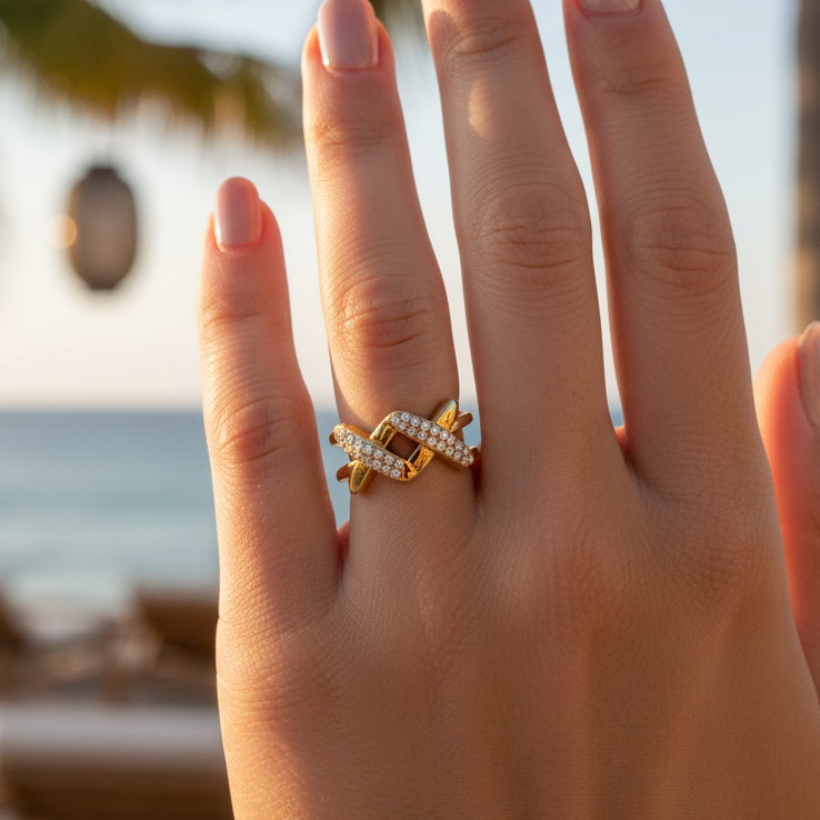 Infinity Cross Studded Ring – Gold-plated stainless steel ring with a cross design and crystal stones