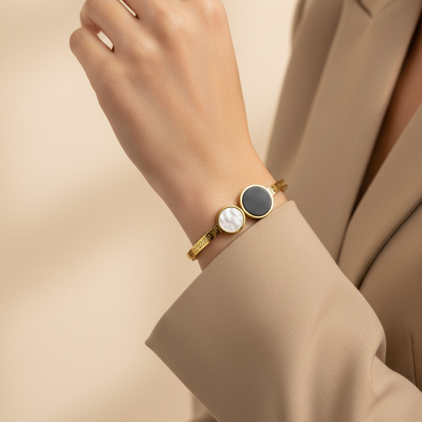 Stainless steel bracelet with gold plating and contrasting circles design - modern classic elegance