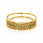 Stainless steel bracelet with Greek-style engraving and gold beads.