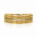 Stainless steel bracelet with Greek-style engraving and gold beads.