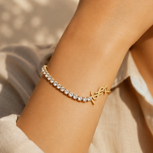 Gold-plated stainless steel bracelet with a sparkling tennis design
