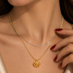 Double-strand stainless steel necklace with a crystal shell pendant