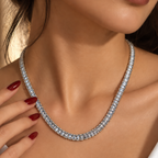 Stainless steel tennis necklace featuring rectangular zirconia stones.