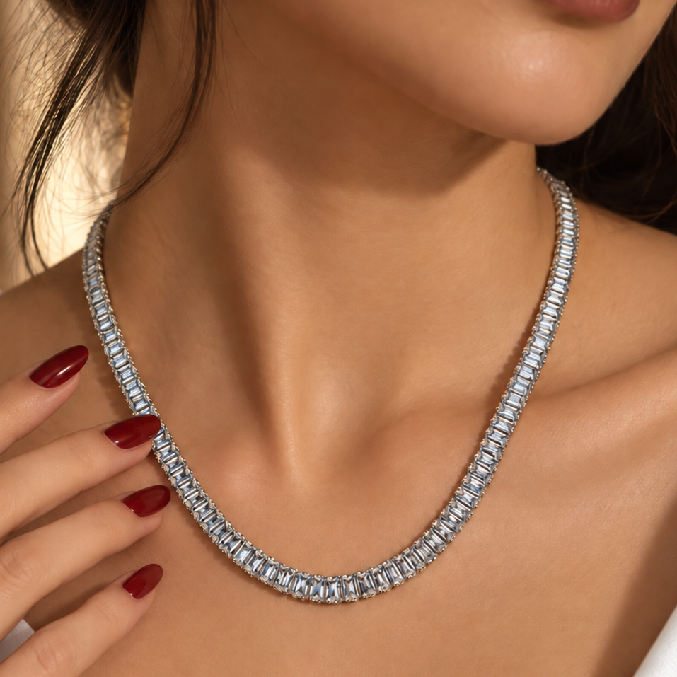 Stainless steel tennis necklace featuring rectangular zirconia stones.
