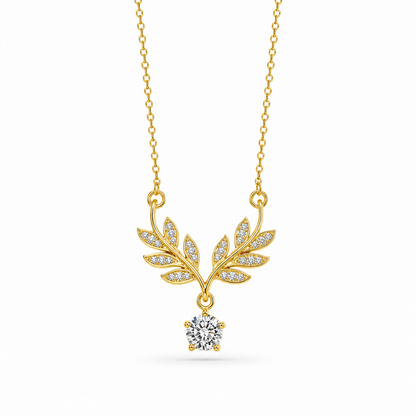 Gold-plated stainless steel necklace with a leaf design and crystal stone