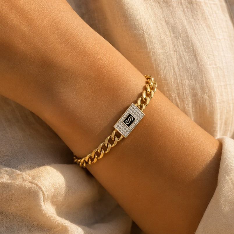 Italian gold-plated bracelet with a delicate chain design and crystal-studded charm.