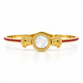 Stainless steel bracelet featuring a mother-of-pearl disc and a Medusa motif with red zircon.