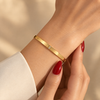 Delicate stainless steel bracelet with a vertical zircon accent.