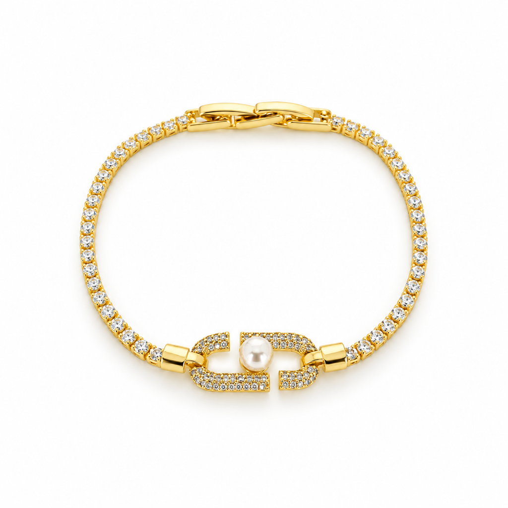 Stainless steel tennis bracelet featuring an embellished link and a pearl.