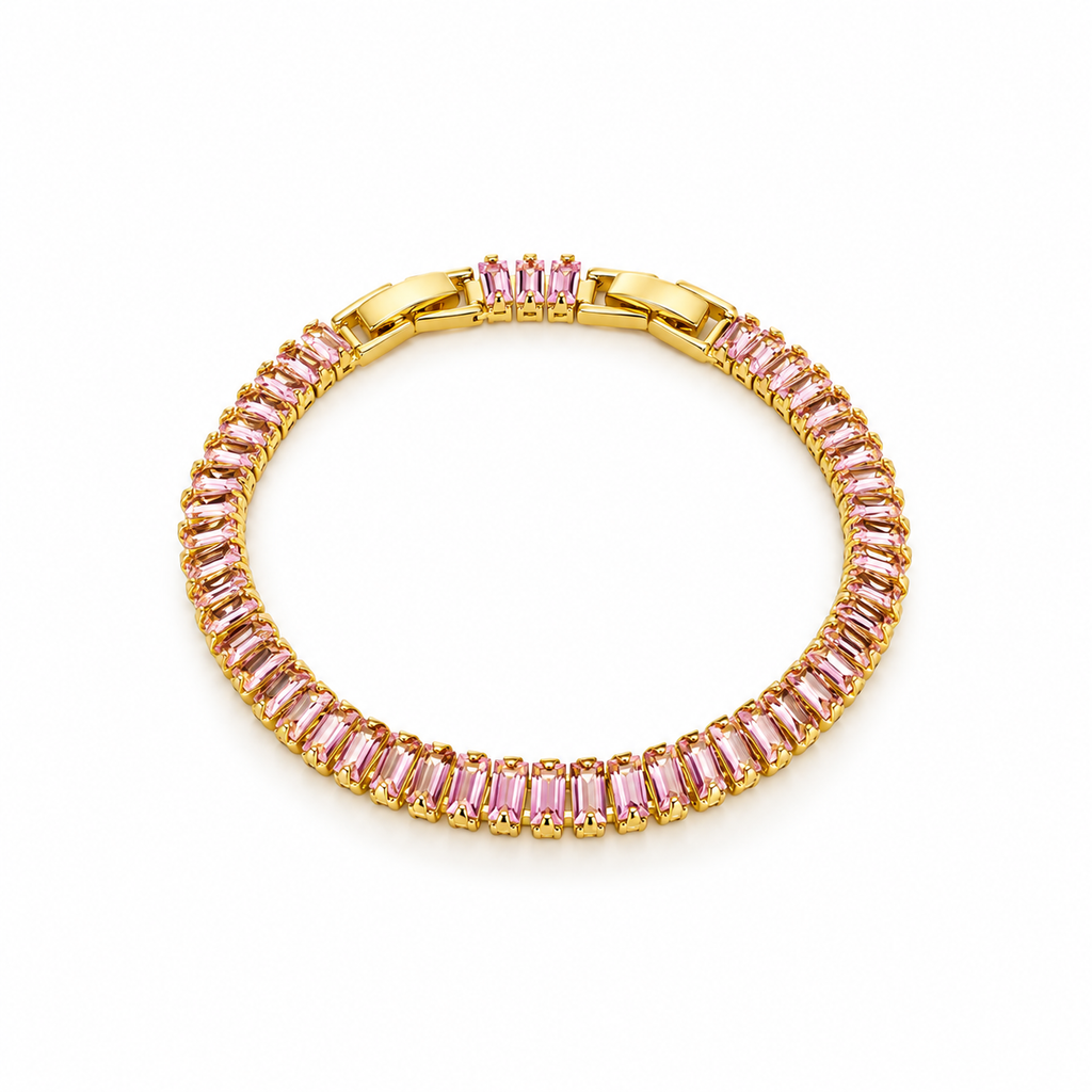 Gold-tone stainless steel tennis bracelet set with pink zircon stones.