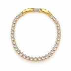 Gold-tone stainless steel tennis bracelet featuring heart-shaped zirconia stones.