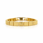 Gold stainless steel bracelet featuring a faceted cube design and screw engravings.