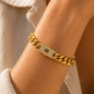 Italian gold-plated bracelet with a treasure chain design and crystal-studded lock