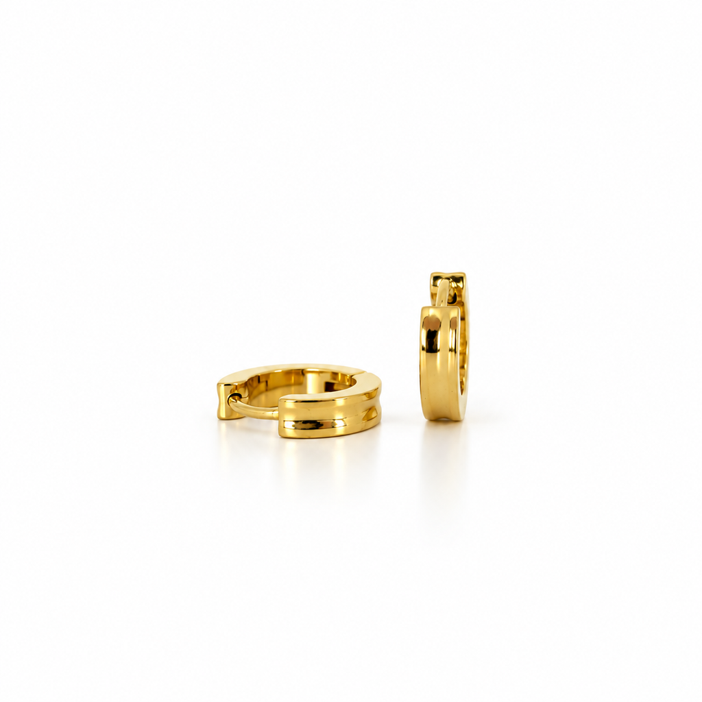 Smooth stainless steel hoop earrings with a concave gold surface.