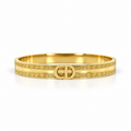 Stainless steel bracelet featuring the "CD" initials and a geometric pattern.