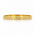 Stainless steel bracelet with a studded checkerboard pattern.