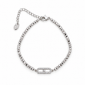 Stainless steel bracelet featuring silver beads and a rectangular, stone-set link.