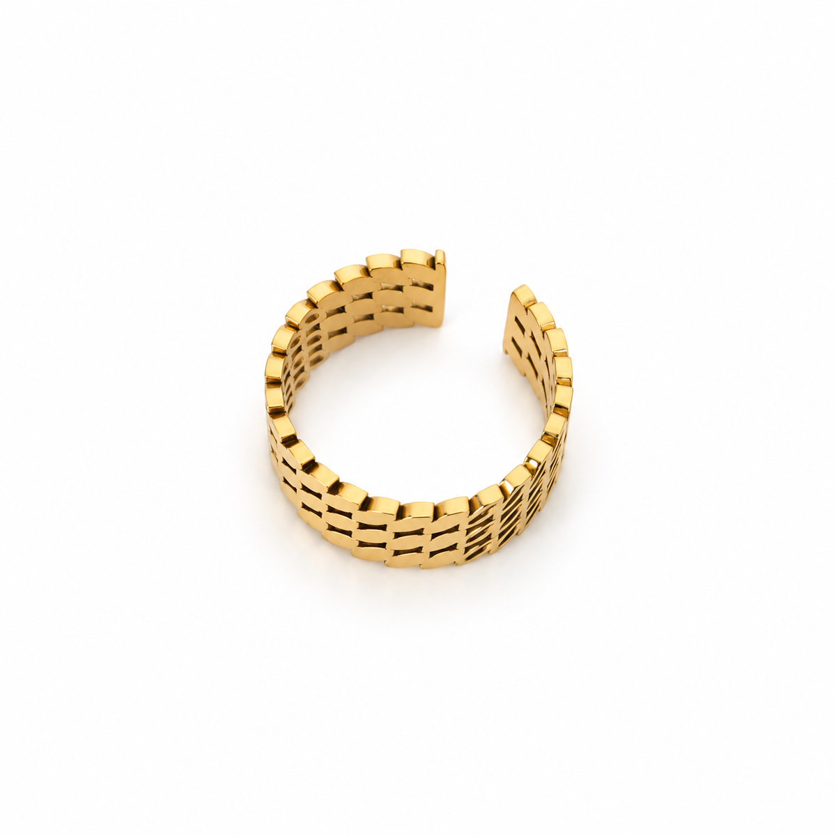 Open stainless steel ring with a cutout leaf design.