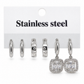 Silver stainless steel earring set (3 pairs) featuring studded designs and a square pendant.