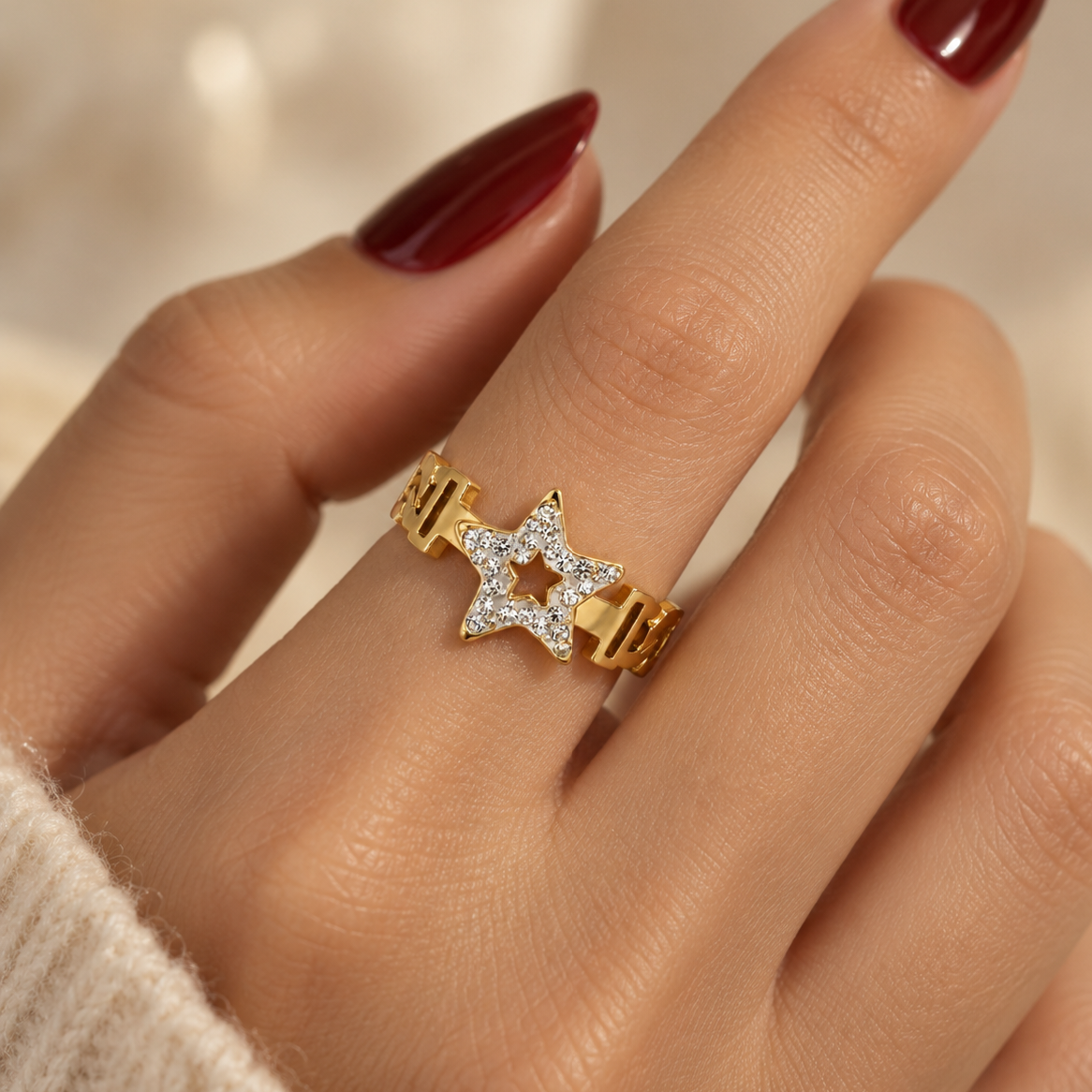 Open stainless steel ring featuring a studded star and a chain link design.