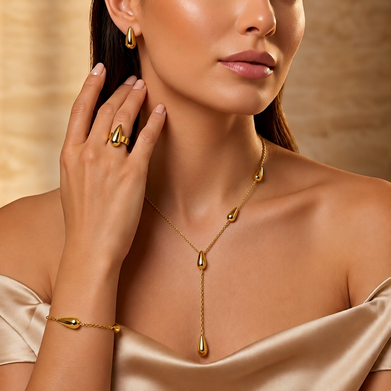 Gold-plated stainless steel jewelry set with a water drop design (4 pieces)