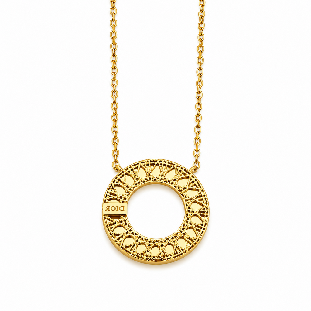 Gold-plated stainless steel necklace with a circular pendant featuring geometric patterns.