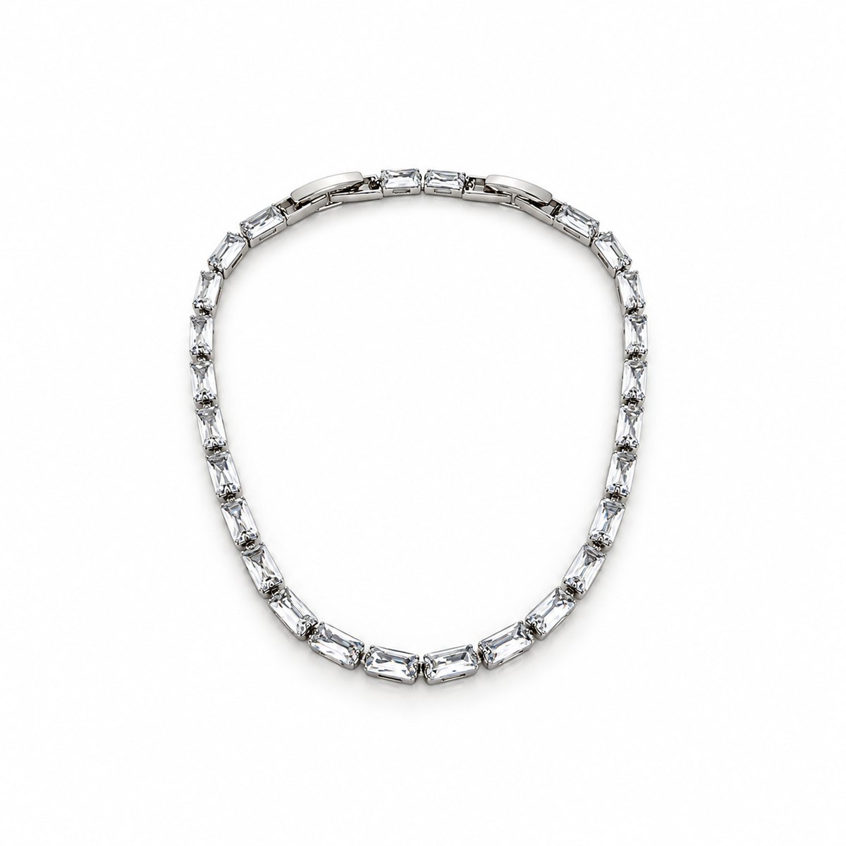 Silver stainless steel tennis bracelet featuring rectangular zirconia stones.