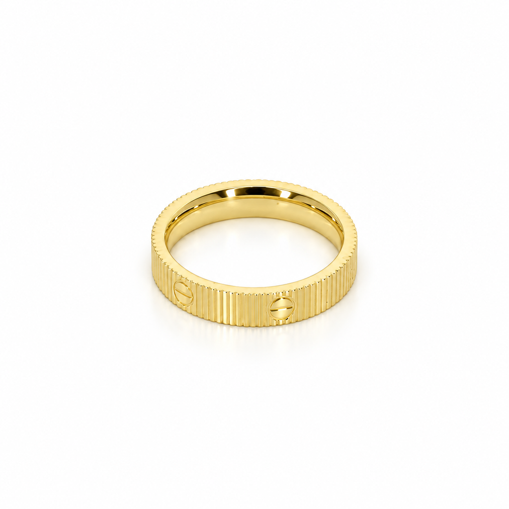 Faceted stainless steel ring with gold screw-head detailing.