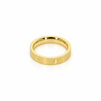Faceted stainless steel ring with gold screw-head detailing.