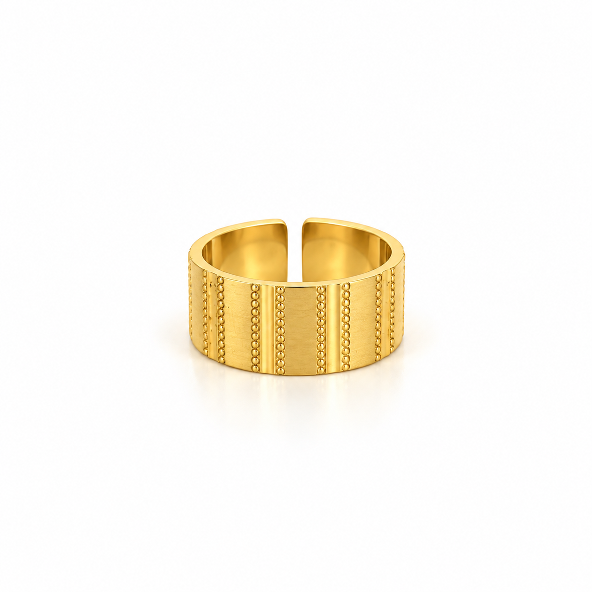 Open stainless steel ring with a wide surface and textured lines.