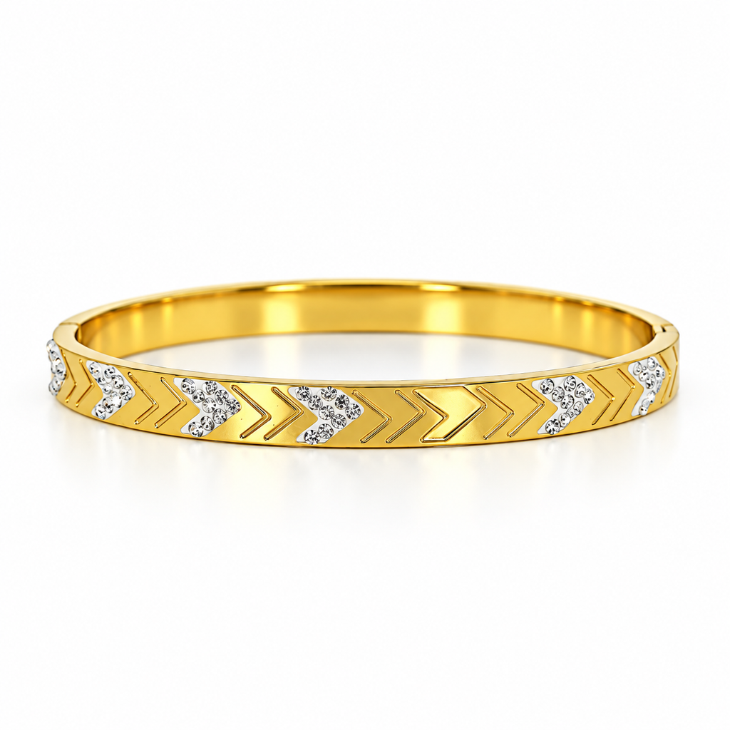 Stainless steel bracelet with a studded arrow design.