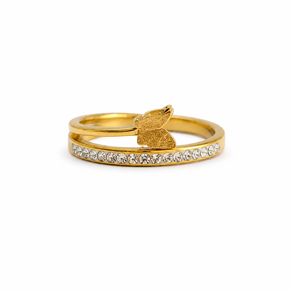 Double gold ring encrusted with crystals and adorned with a delicate butterfly