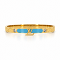 Stainless steel bracelet with gold letters and a sky-blue enamel strip.