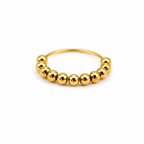 Ring with a design featuring moving metal balls