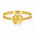 Stainless steel bracelet with an ornate clover petal design.