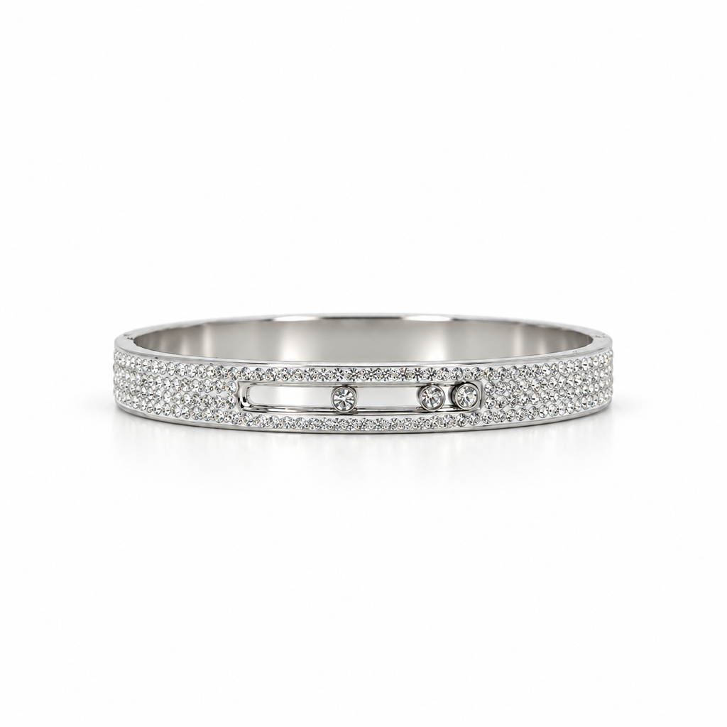 Silver stainless steel bracelet featuring moving, studded stones.