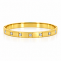 Stainless steel bracelet with gold-tone segments and zircon.