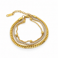 Three-layer stainless steel bracelet featuring the sparkle of tennis and chain styles.